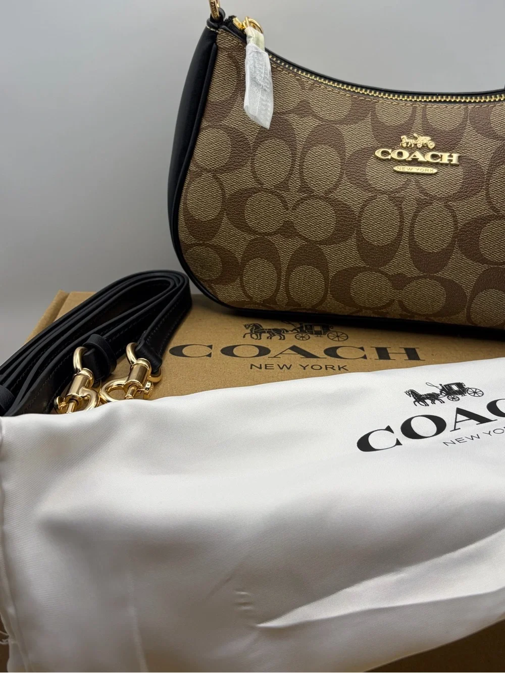 Coach Brown Signature Canvas Shoulder Bag with Black Trim and Gold Hardware